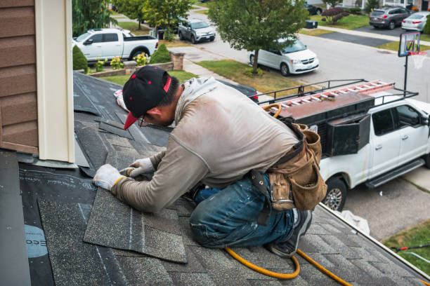 Professional Roof Replacement technician working in Bergholz, OH